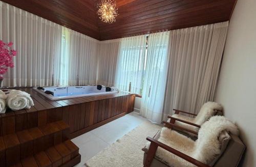 Vitor Hugo House | Refúgio Premium nas Montanhas de Alfredo Chaves Refúgio nas Montanhas de Alfredo Chaves com Piscina Jacuzzi Aquecida externa Suite Master com Hidro e Área Gourmet