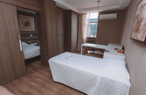 Civic Center Hotel | Relax + Work: Triple Twin Suite w/Rooftop Sauna, Fitness Center