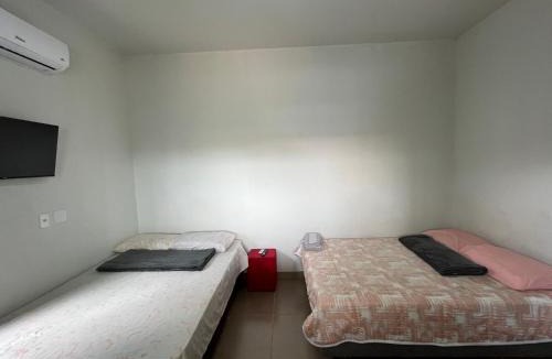 Plano Diretor Sul House | Residencial Jasmim quarto Standard 01