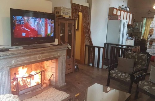 Sao Francisco de Paula House | Rustic Stone House in a Gated Community.