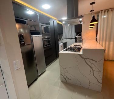 Ze Amandio Apartment | Seu refúgio em Bombinhas, conforto e pé na areia