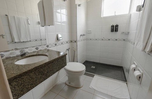 Umuarama Hotel | Simple Yet Practical Room l Close Orlando de Carvalho Airport - 3.1 miles