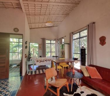 Colinas do Sul House | Sitio Cocoroca - casa com banheira, vista para a mata e acesso ao rio