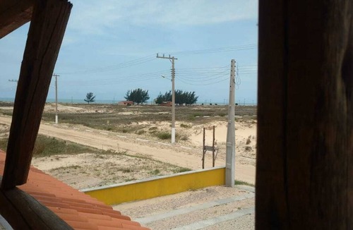 Jaguaruna House | Slate stone house with balcony, 180m from the beach.