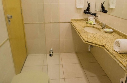 Civic Center Hotel | Sleek Single Room in Curitiba Ideal for Executives Seeking Work + Relax Balance