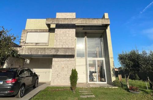 Capao da Canoa House | Sobrado Araçá