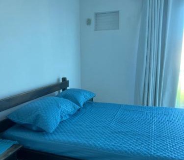 Foguete Apartment | sol areia mar
