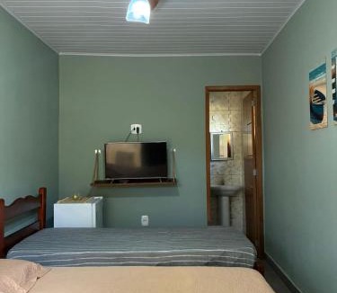 Porto da Roca House | Sol e Sal Suítes Aconchegantes