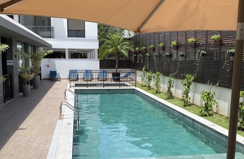 Campeche Leste Apartment | Spacious and beautiful Studio with swimming pool, terrace and barbecue! 500 meters from the beach!