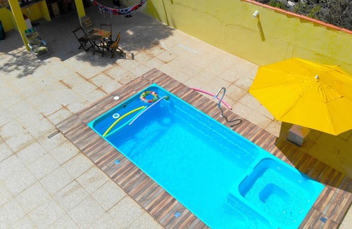 Caravelas House | Spacious house with 3 suites and a swimming pool.