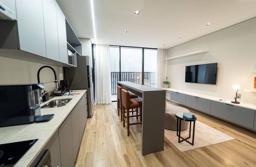 Estados Condo | Spot One Garden Apartment
