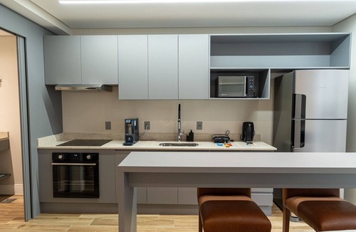 Estados Condo | Spot One Garden Apartment