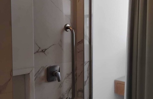 Sao Conrado Hotel | Stay in a work of art with a panoramic bath overlooking sea and mountains.
