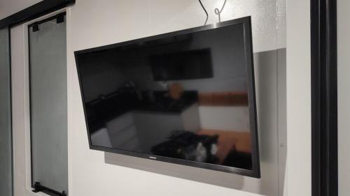 Ahu Apartment | Studio 1 com Ar condicionado Quente e Frio Completo perto de tudo WIFI e lavanderia