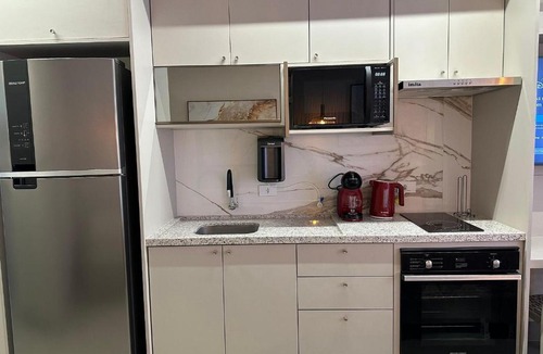 Zona 01 Apartment | Studio 1502 com sacada, garagem e A/C