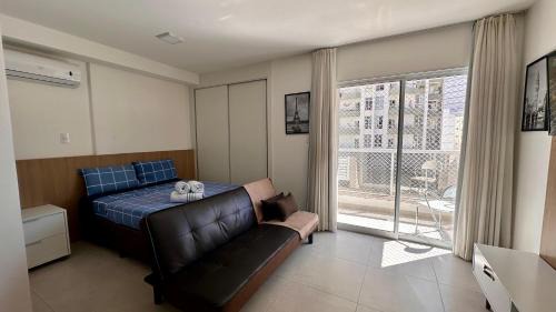 Centro Apartment | Studio 822 - Atmosfera Urbana com Garagem