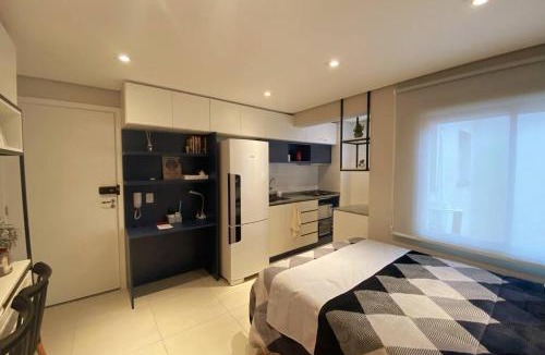 Simoes Lopes Apartment | Studio central completo! Garagem coberta para carros médios Sem elevador