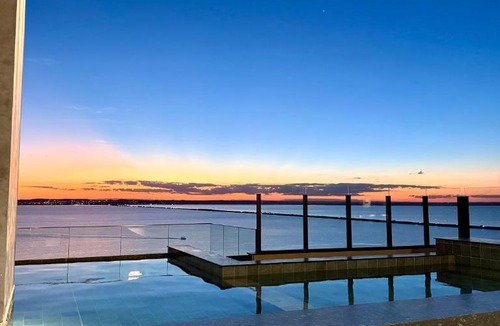 Plano Diretor Sul Apartment | Studio Luxo Vista Lago, Design Jalapão e Orla