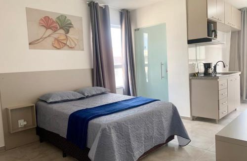 Barbacena Apartment | Studio moderno com cozinha completa e Wi-Fi centro