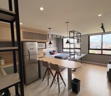 Rio Branco Apartment | Studio moderno, perto de tudo com garagem e ar