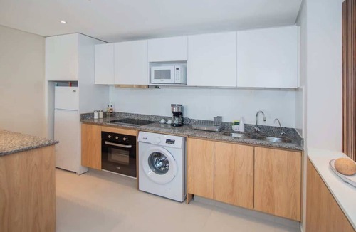 Asuncion Apartment | Stylish Stay w/Private Patio | Pool, Gym Access