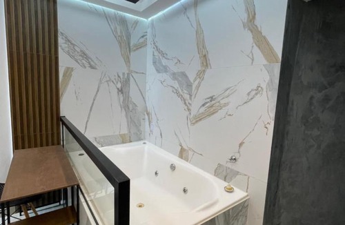 Centro Apartment | Suíte Gold com Hidromassagem 301