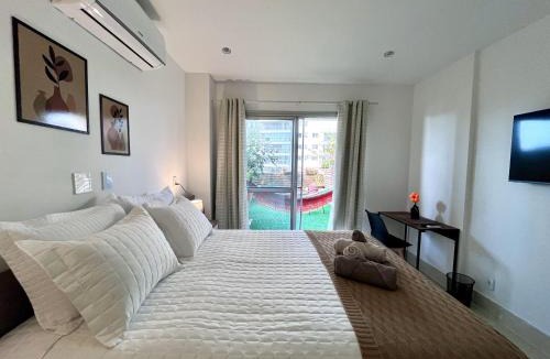 Jacarepagua Apartment | Suíte com jardim e piscina na Barra Olímpica RJ