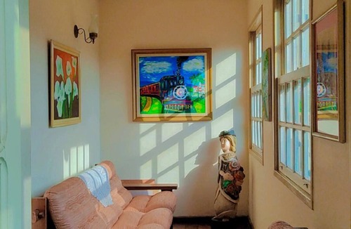 Ouro Preto Apartment | Suíte com Vista Para a Montanha