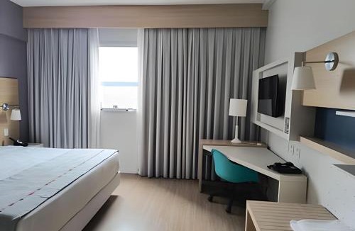 Pompeia Hotel | Suíte em flat no Gonzaga Stay Helbor