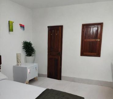 Marambaia House | suíte feliz