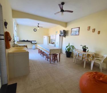 Piuma House | Suíte independente com cozinha e varanda