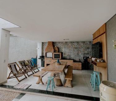 Planalto House | Suítes em casa ampla com área gourmet