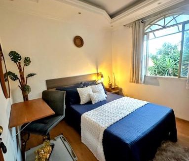 Belo Horizonte House | Suite casal com frigobar