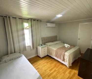 Bela Vista House | Suite em Hospedagem 100m da BR!