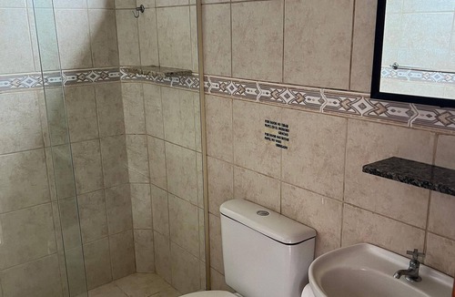 Garopaba House | Suite Térrea Premium - Pousada Buena Onda - SC
