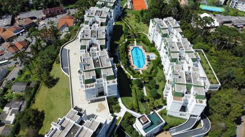 Vila Inglesa Apartment | Superitá Campos do Jordão - Apto de alto padrão com estrutura de resort perto do Capivari e Morro do Elefante