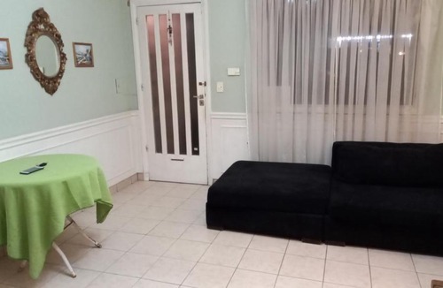 Trelew Apartment | Tejas rojas