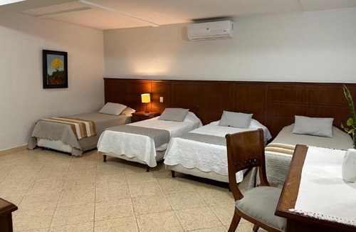Lambare Hotel | Terrazas Vista Verde