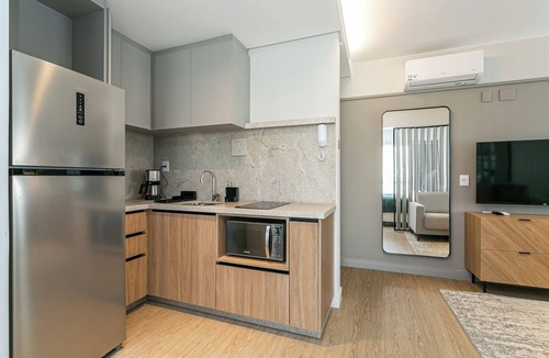 Centro Apartment | The Bridge by Viva - Prédio com piscina no terraço e academia em Floripa