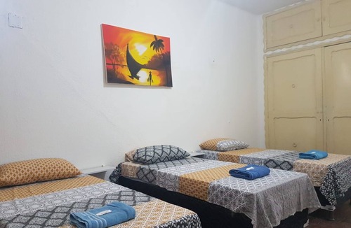 Meireles House | Triple room with private bathroom, Wi-Fi, air conditioning and TV.