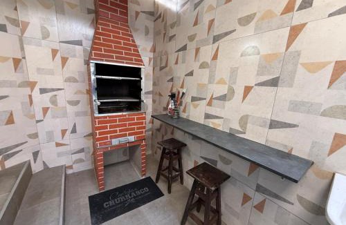 Umuarama Apartment | TRIPLEX piscina churrasqueira lava e seca Wi-Fi e 2 TVs em Condomínio com 90m2 no centro de Ubatuba