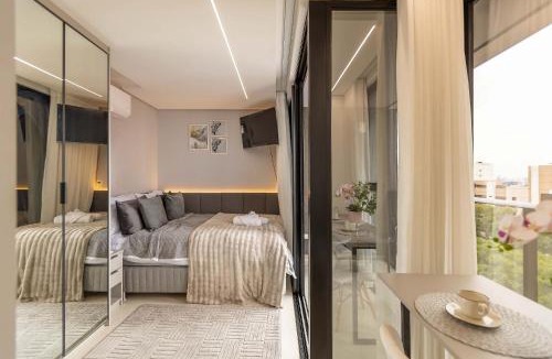 Agua Verde Apartment | Varanda panorâmica | Suíte Comfort Batel