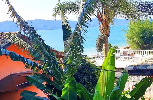 Daniela Cottage | Veranda - Charming 3-bedroom Cottage with AC in Peacefull Daniela Florianopolis