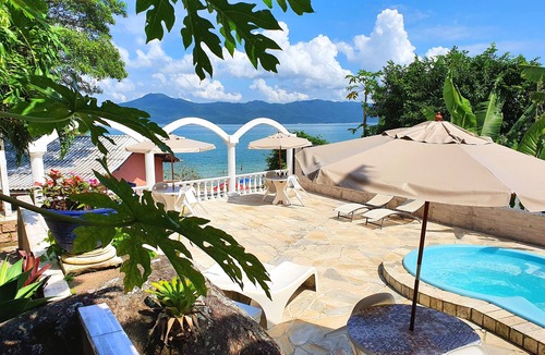 Daniela Cottage | Veranda - Charming 3-bedroom Cottage with AC in Peacefull Daniela Florianopolis