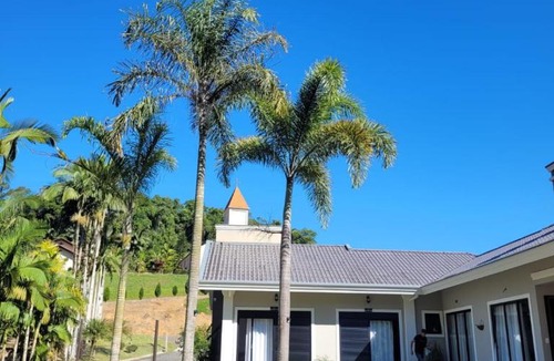Pomerode House | Villa Pomerode Hospedagem - Suítes com conforto e aconchego conectados com a Natureza
