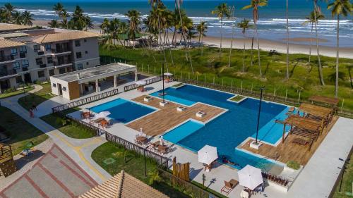 Sao Domingos Apartment | Viva com Conforto e Clima de Resort - Pé na areia