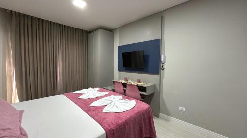 14- Studio decorado com ótima localização!