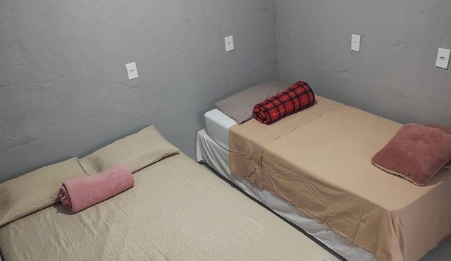 2-bedroom house 850m from the beach, sleeps up to 10 people.