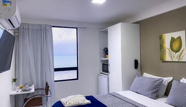 Acomodação aconchegante à beira- mar