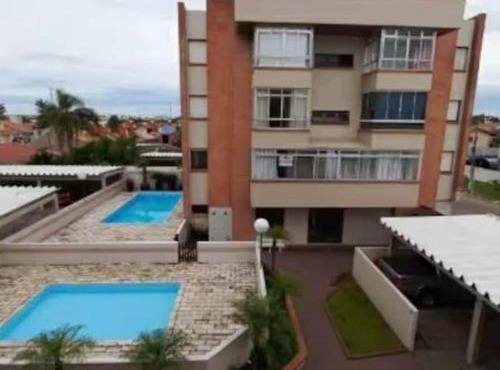 Aconchegante apartamento 2 dormitórios, sendo uma suíte, com piscina